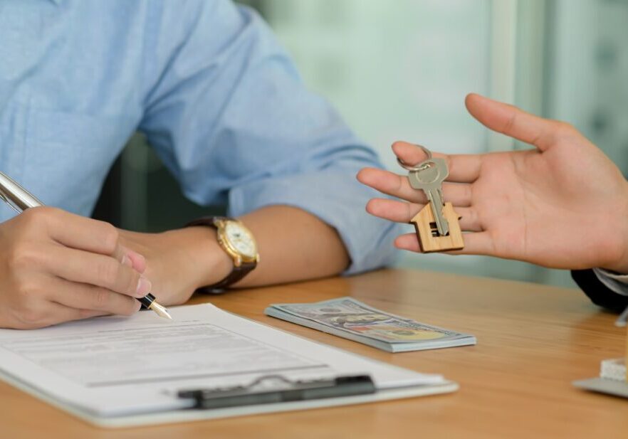 Homebuyers signing